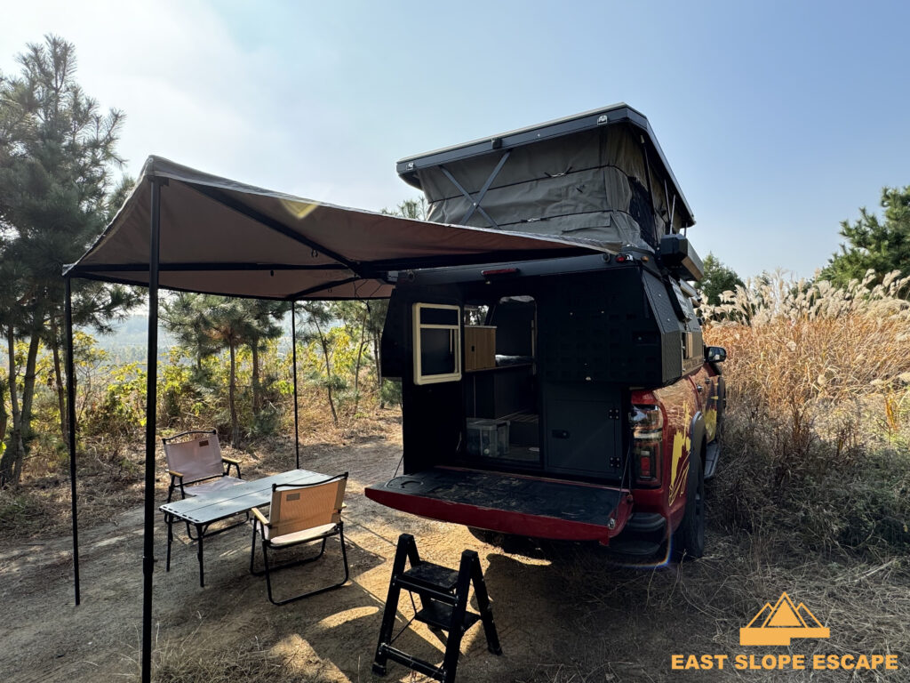 Ground Pod camper from back, with shade
