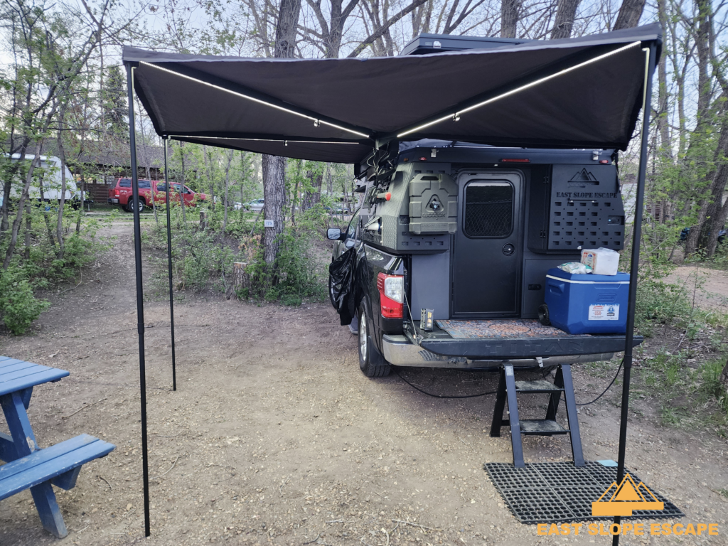 Rear view of a pop-up camper with extension,